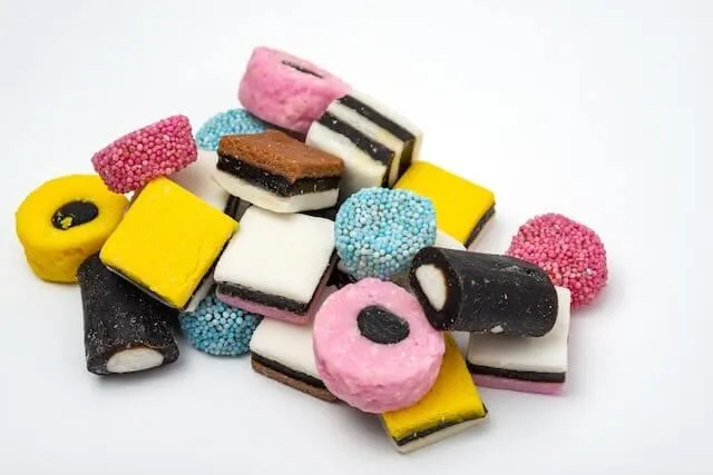 different kinds of sweets on a white surface
